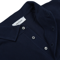 A close up of a Gran Sasso Navy Fresh Cotton Mesh Polo Shirt.