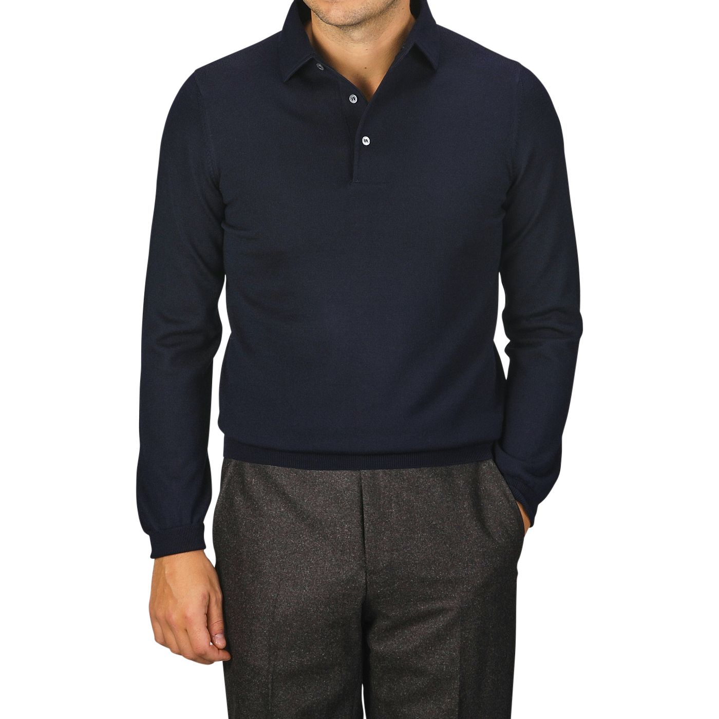 A person wearing a Navy Merino Wool One-Piece Collar Polo Shirt by Gran Sasso and brown trousers stands with one hand in their pocket.