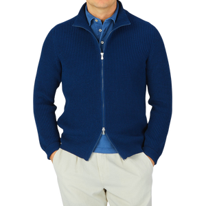 A man wearing a Gran Sasso Dark Blue Rib Stitch Cotton Full-Zip Sweater.