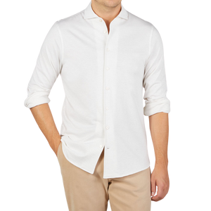 A man wearing a Gran Sasso Off-White Cotton Cashmere Knitted Shirt.