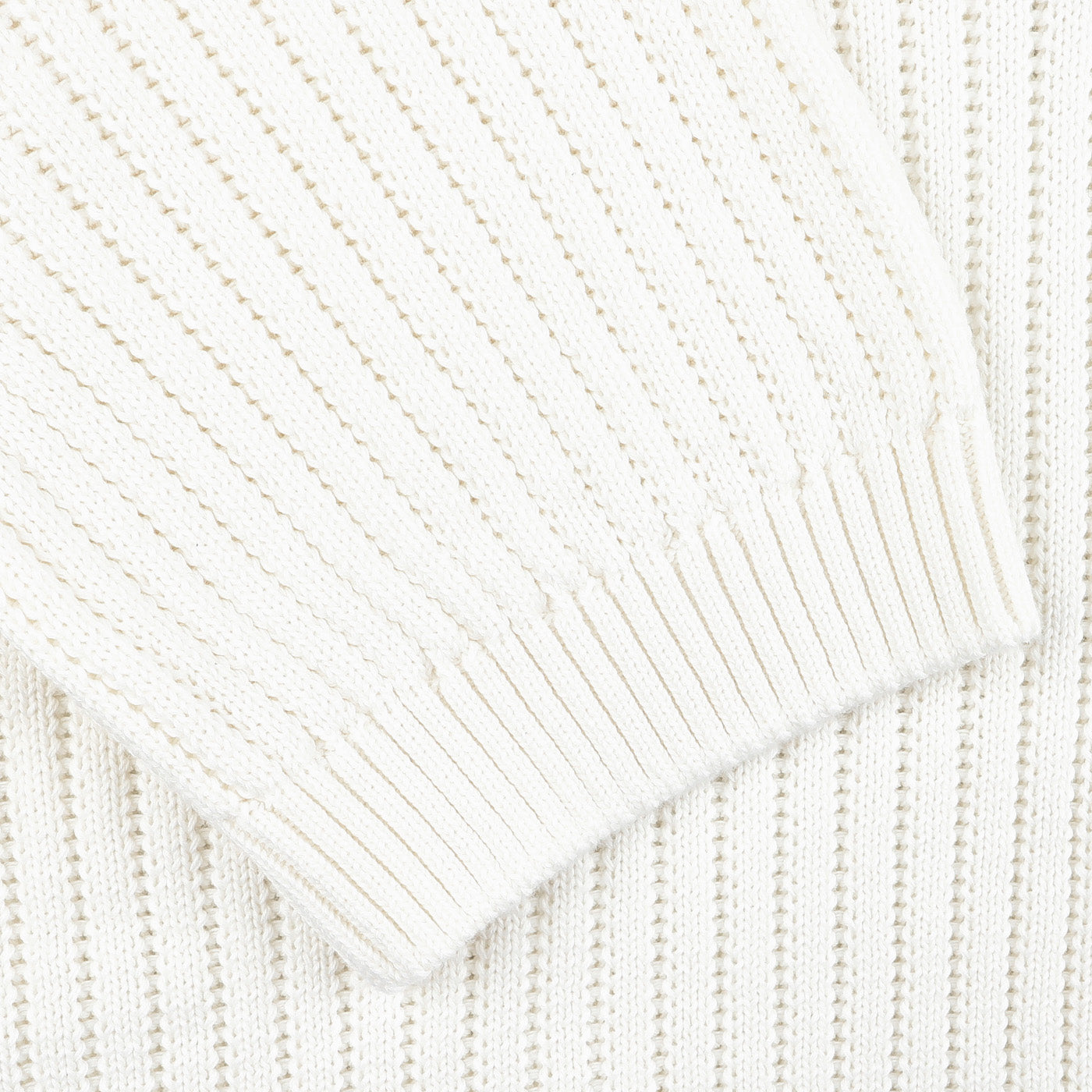 Close-up of Gran Sasso's Off-White Organic Cotton Polo Shirt, showcasing a chunky-knit fabric with detailed sleeve work.