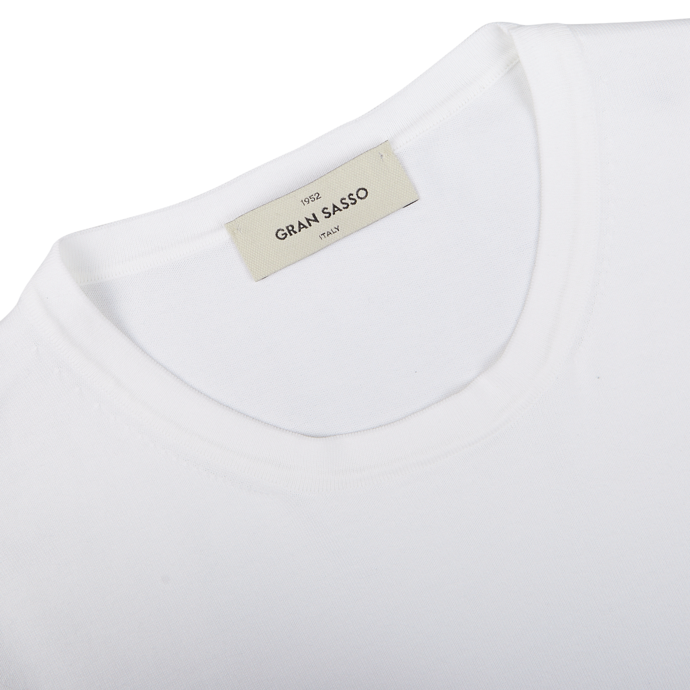 Close-up of a Gran Sasso Off-White Organic Cotton T-shirt label.