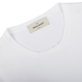 Close-up of a Gran Sasso Off-White Organic Cotton T-shirt label.