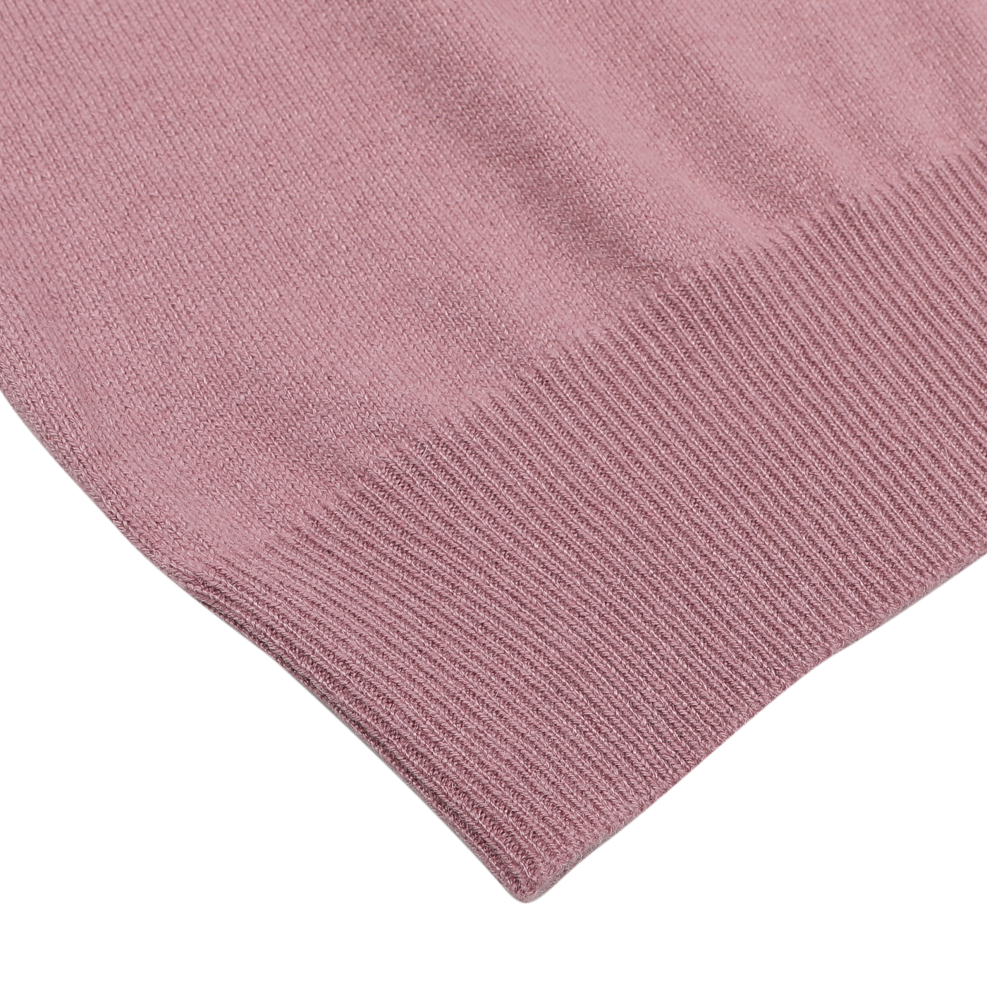 Close-up of a Pale Pink Cashmere Crewneck Sweater by Gran Sasso, highlighting the ribbed cuff detail against a white background.