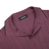 The lightweight Plum Knitted Silk Polo Shirt from Gran Sasso has a collar.