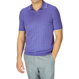 A man in a purple Gran Sasso Knitted Silk polo shirt.