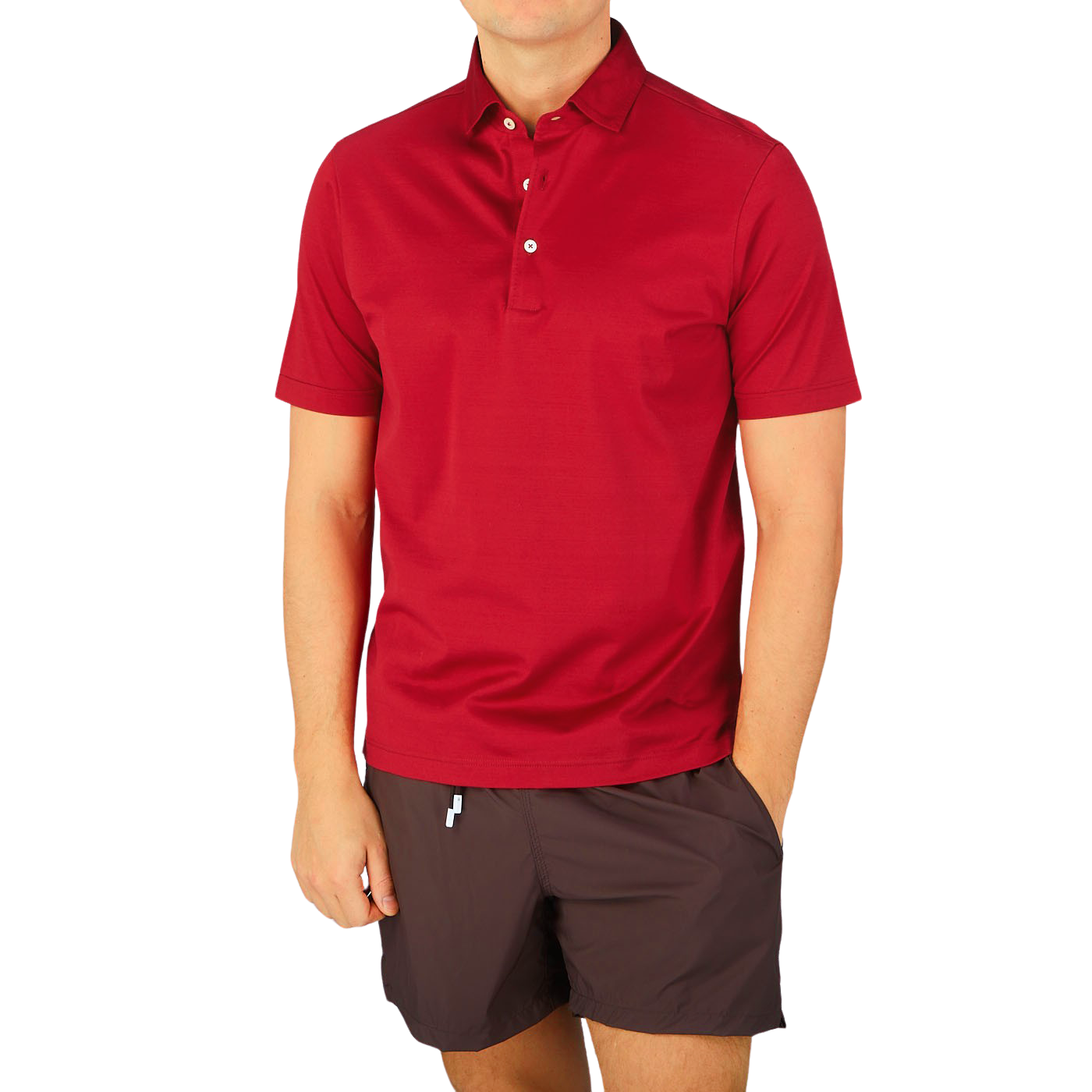 A man wearing a Gran Sasso Raspberry Red Cotton Filo Scozia polo shirt and shorts.