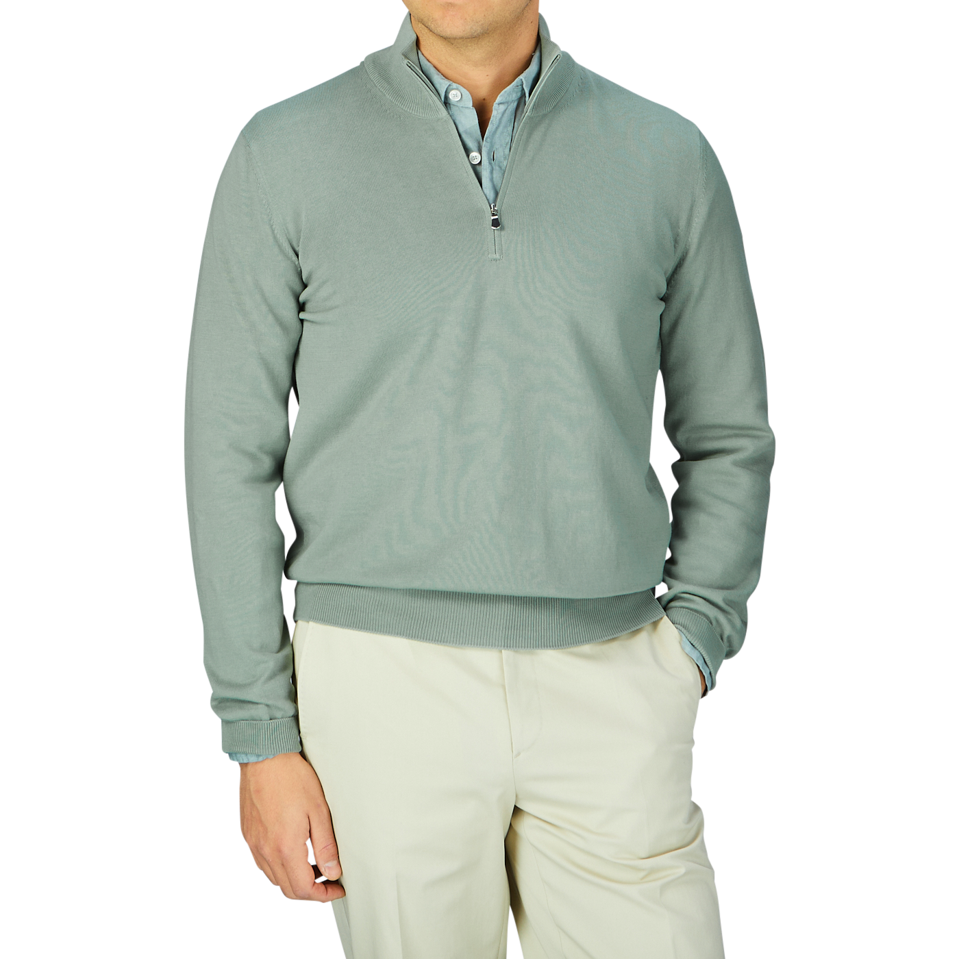 Man wearing a slim fit Gran Sasso Sage Green Egyptian Cotton 1/4 Zip Sweater and cream trousers.