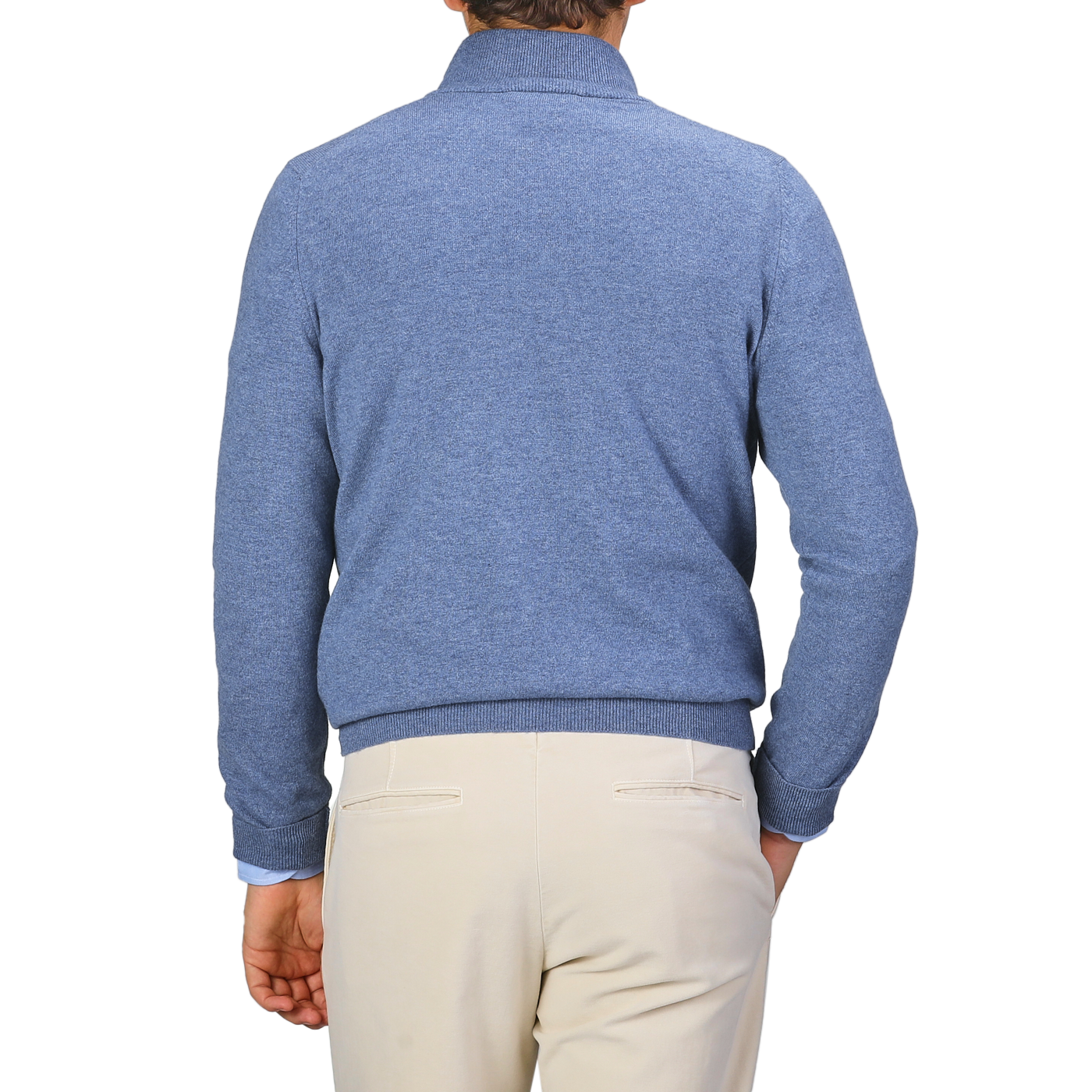 A person wearing a Gran Sasso Sky Blue Cashmere 1/4 Zip Sweater and beige pants stands facing away.