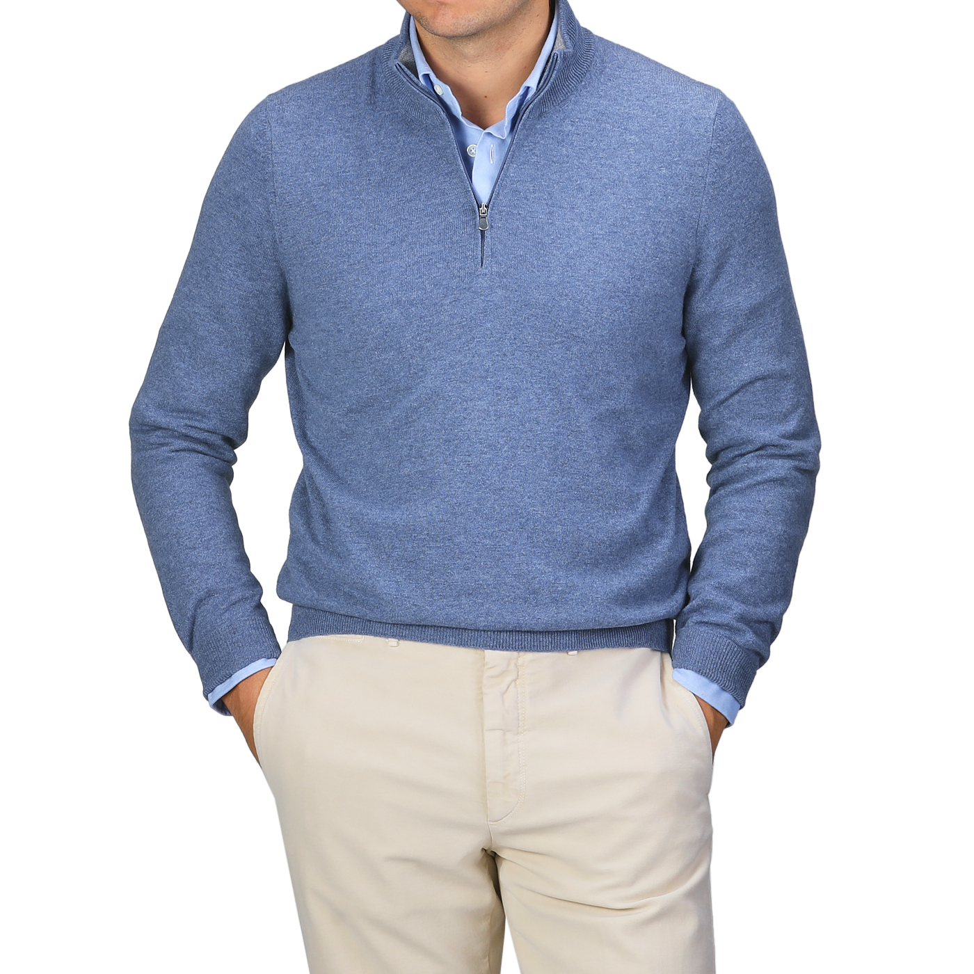 A person wearing the Gran Sasso Sky Blue Cashmere 1/4 Zip Sweater over a light blue shirt and beige pants, standing with hands in pockets.