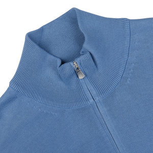 Close-up of a Sky Blue Egyptian Cotton 1/4 Zip Sweater with a half-zip collar by Gran Sasso.