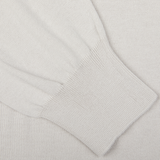 Close-up of a Gran Sasso Taupe Beige Organic Cotton LS Polo Shirt with ribbed cuff detail.