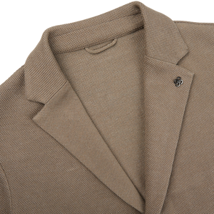 A close up of a slim fit Taupe Brown Cotton Linen Knitted Blazer by Gran Sasso.