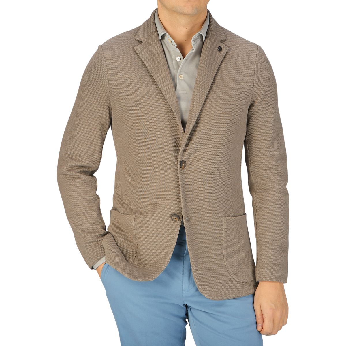A man wearing a Gran Sasso Taupe Brown Cotton Linen Knitted Blazer and slim fit blue pants.