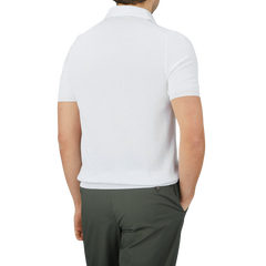 A man in a White Fresh Cotton Mesh Polo Shirt made by Gran Sasso.