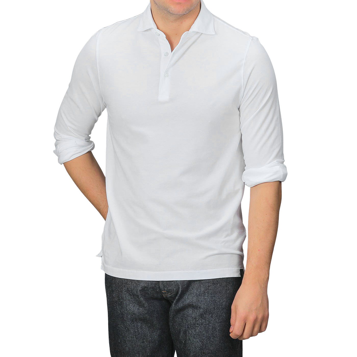 A person wearing a Gran Sasso White Washed Cotton Popover Shirt with rolled-up sleeves and dark jeans stands against a gray background.