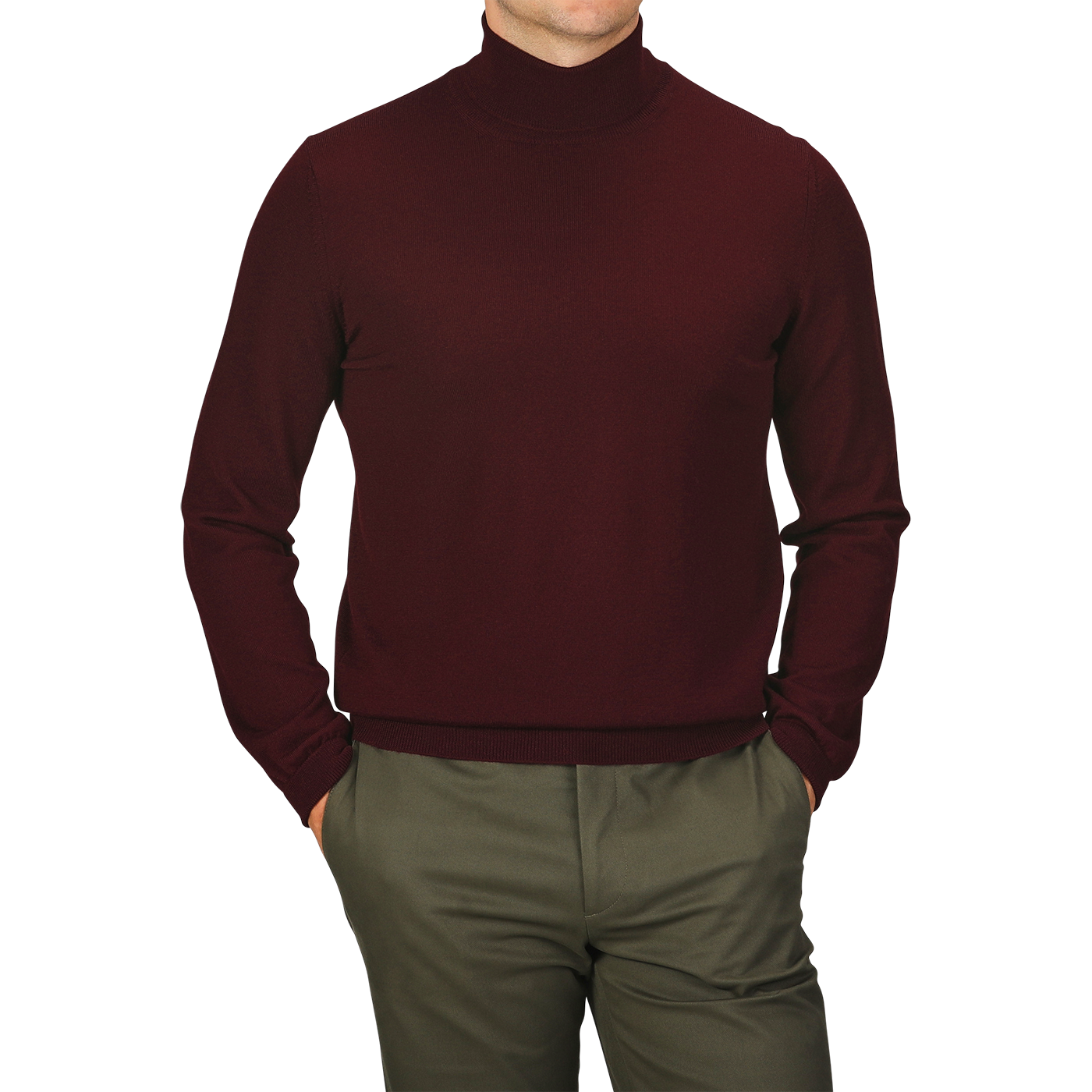 A person wearing a slim fit, Wine Melange Extra Fine Merino Roll Neck sweater by Gran Sasso and green pants, with hands in pockets against a white background. The person's face is not visible.