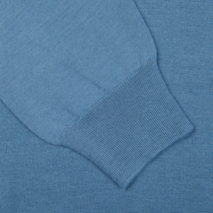 A close up of a blue Gran Sasso Travel Wool Knitted LS Polo Shirt.
