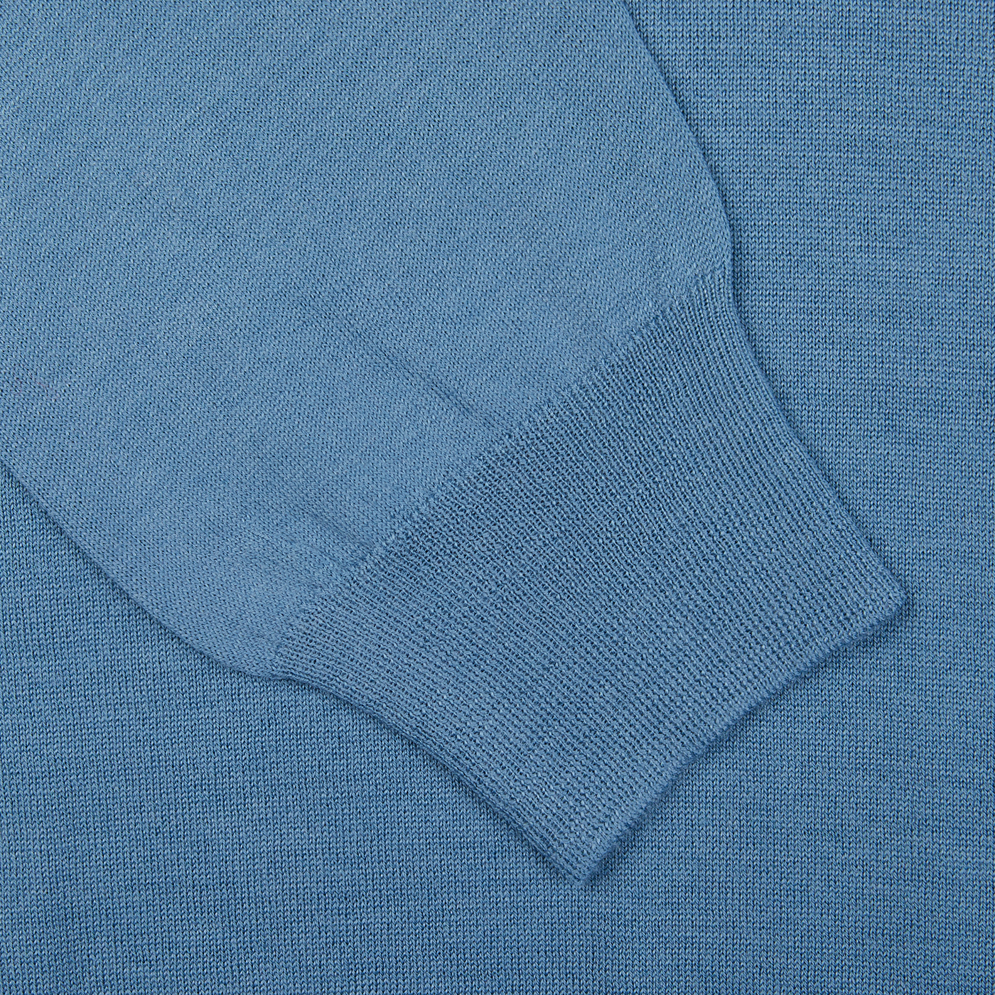 A close up of a blue Gran Sasso Travel Wool Knitted LS Polo Shirt.