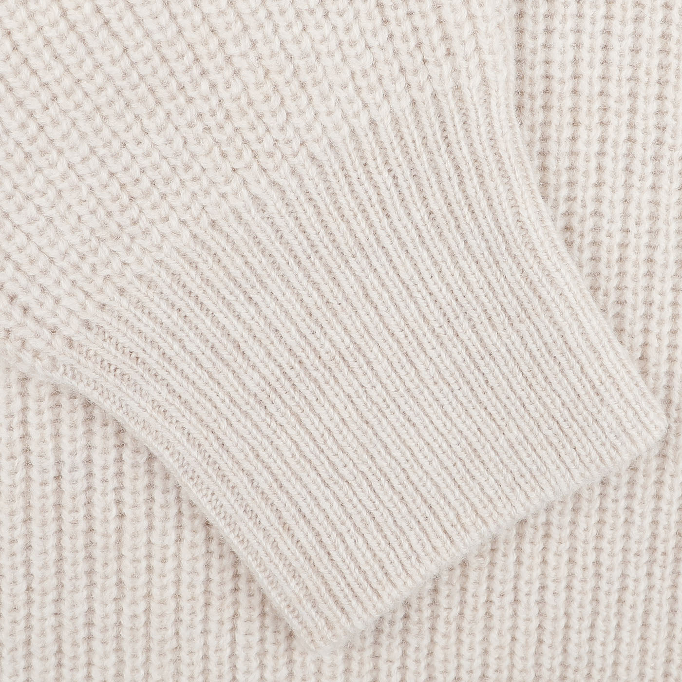 Close-up of the Ecru Beige Chunky Knit Wool Polo Shirt by Gran Sasso, highlighting its intricate ribbing and rich texture in super Geelong wool.