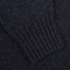 Close-up of a Cosmos Blue Extrafine Lambswool Crewneck sleeve featuring ribbed cuff detail, highlighting the renowned knitwear craftsmanship of Harley of Scotland.