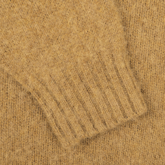 Close-up of the sleeve from the Asparagus Brushed Shaggy Wool Crewneck sweater, featuring a ribbed cuff texture that echoes Harley of Scotland craftsmanship.