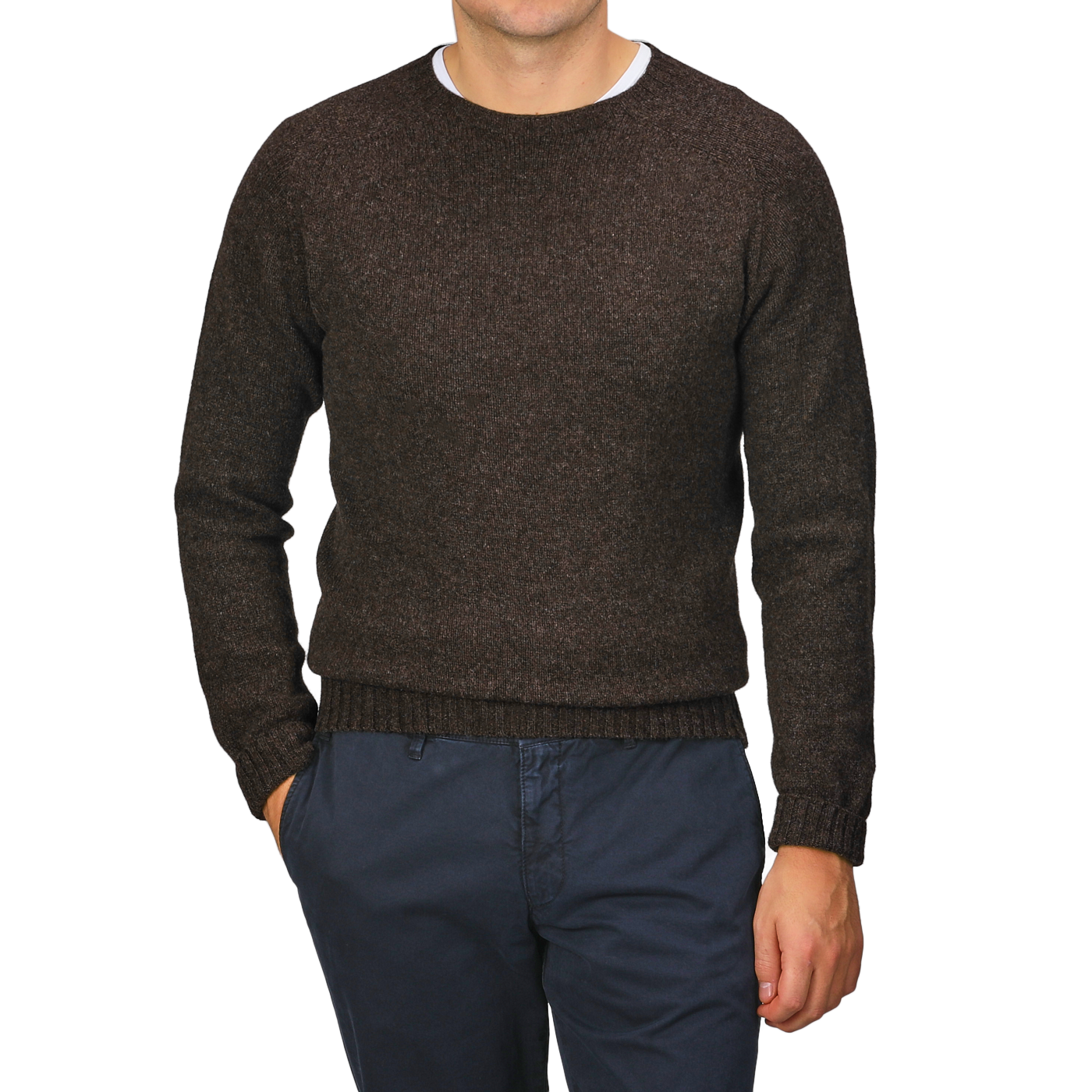 A person wearing a Porcupine Brown Extrafine Lambswool Crewneck by Harley of Scotland and navy pants stands against a neutral background.