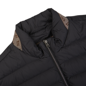 An Italian outerwear Herno black nylon goose down quilted gilet with a zippered collar.