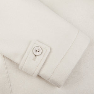 A close up of a Herno Cream Beige Water Repellent Cashmere Car Coat with buttons.