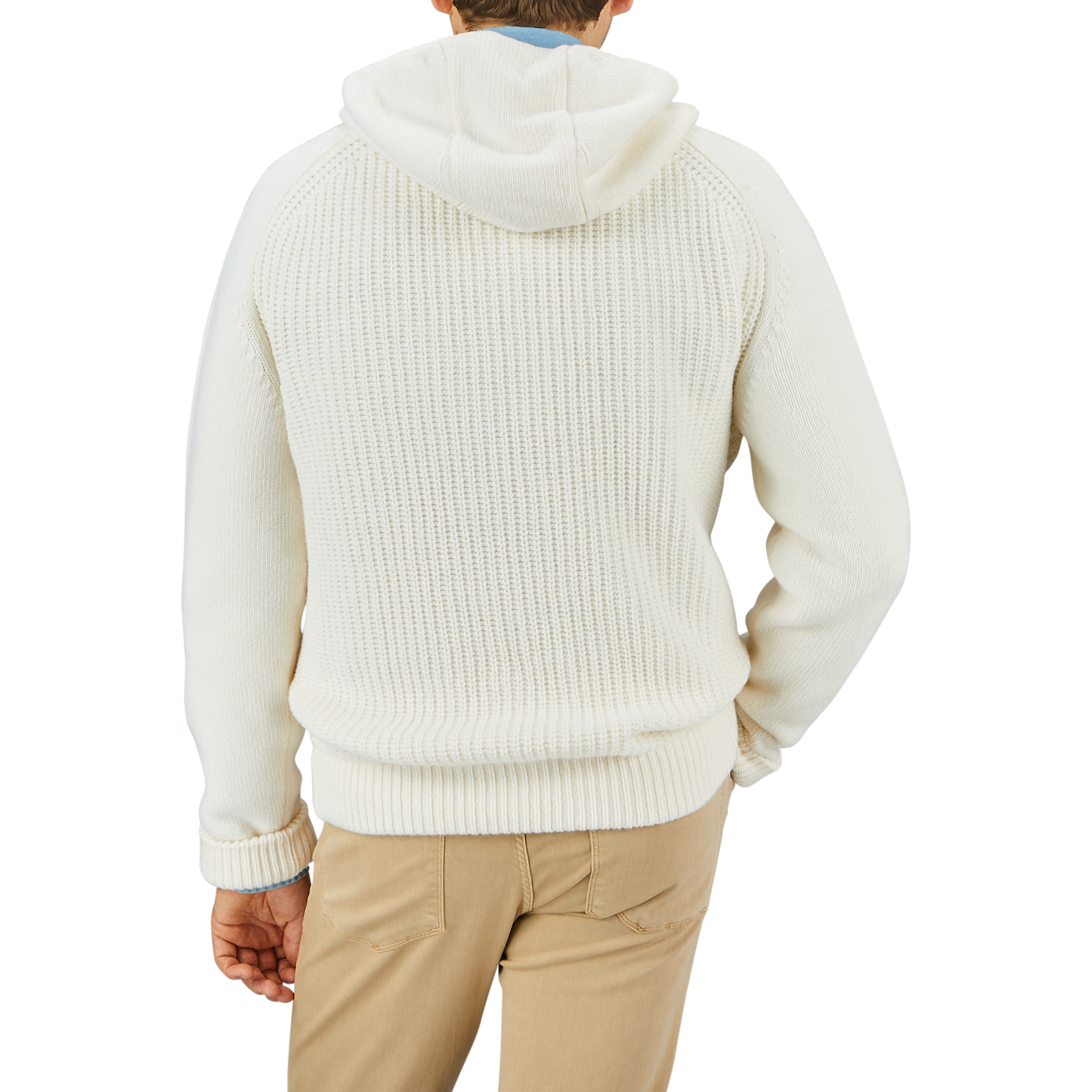 A person wearing a Herno Cream Wool Nylon Reversible Knitted Jacket and tan pants is standing facing away from the camera against a plain background.