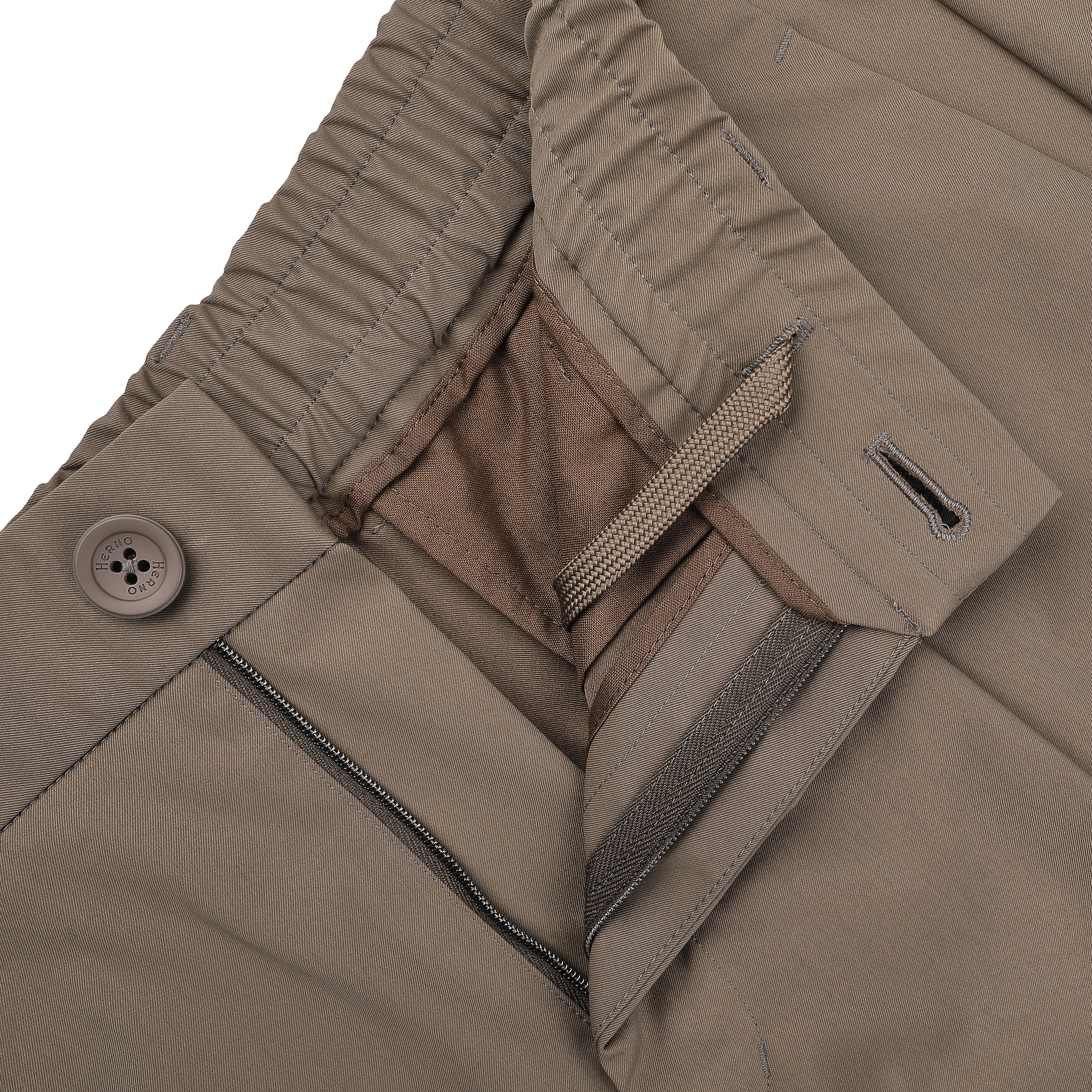 Close-up of Herno's dark beige nylon stretch drawstring trousers, featuring an open zipper, button closure, and elastic waistband for a blend of casual comfort and modern style with a slim fit.