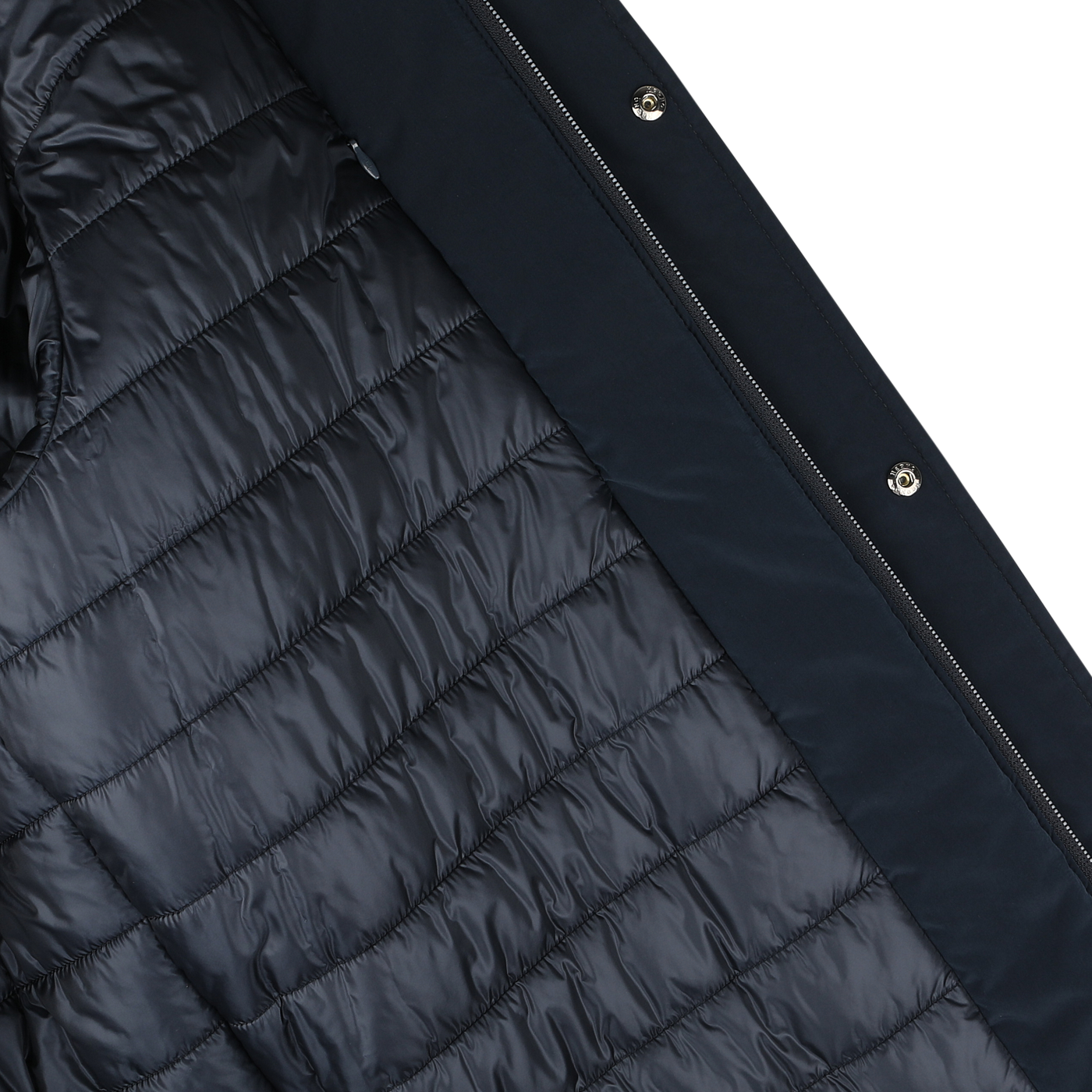 Close-up of the interior of the Herno Dark Blue Nylon Technical Padded Jacket with quilted stitching, featuring zipper and snap button closures. This jacket is wind- and water-repellent, offering both style and functionality.