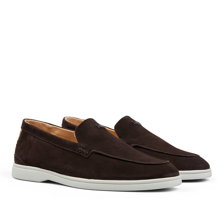 A pair of Herno dark brown suede slip-on loafers with white rubber soles displayed on a neutral background.