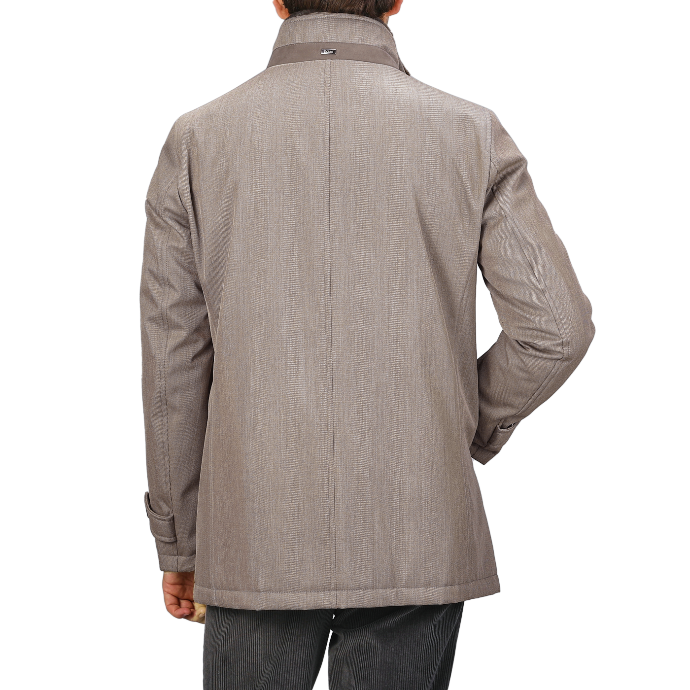 A person is seen from behind wearing a luxurious Light Brown Loro Piana Wool Twill Jacket by Herno, which features a clean and simple design.