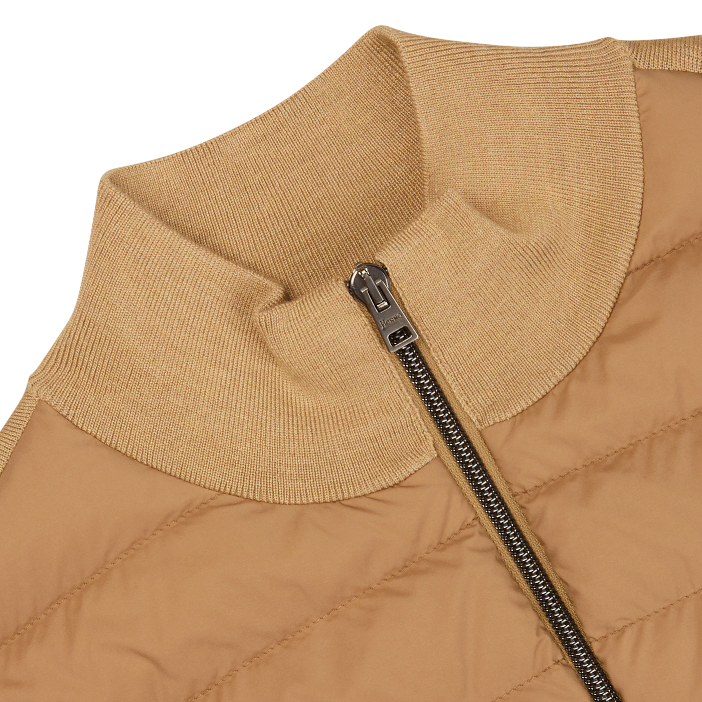 Close-up of a Herno light camel wool silk nylon padded jacket with a ribbed collar and a partially zipped silver zipper.