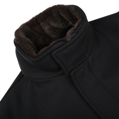 Close-up of a slim fit Navy Blue Diagonal Wool Padded Coat by Herno, featuring a high collar lined with dark brown fur. The coat's material appears textured, offering lightweight thermal insulation.