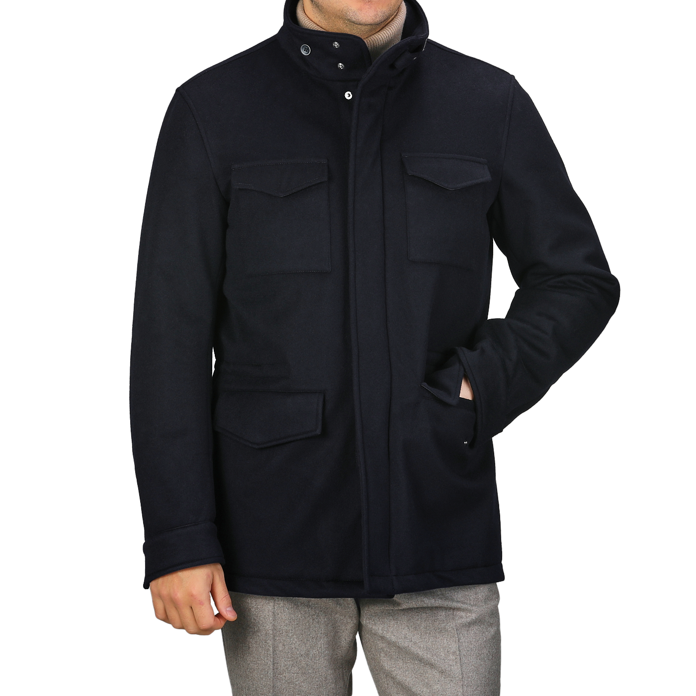 A person wearing a Herno Navy Blue Loro Piana Wool Field Jacket with four pockets over light gray pants.