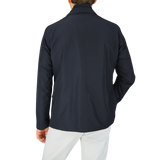 The back view of a man wearing a Herno Navy Blue Nylon Hybrid Blazer.