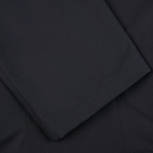 A close up of the pocket of a Herno Navy Blue Nylon Hybrid Blazer.