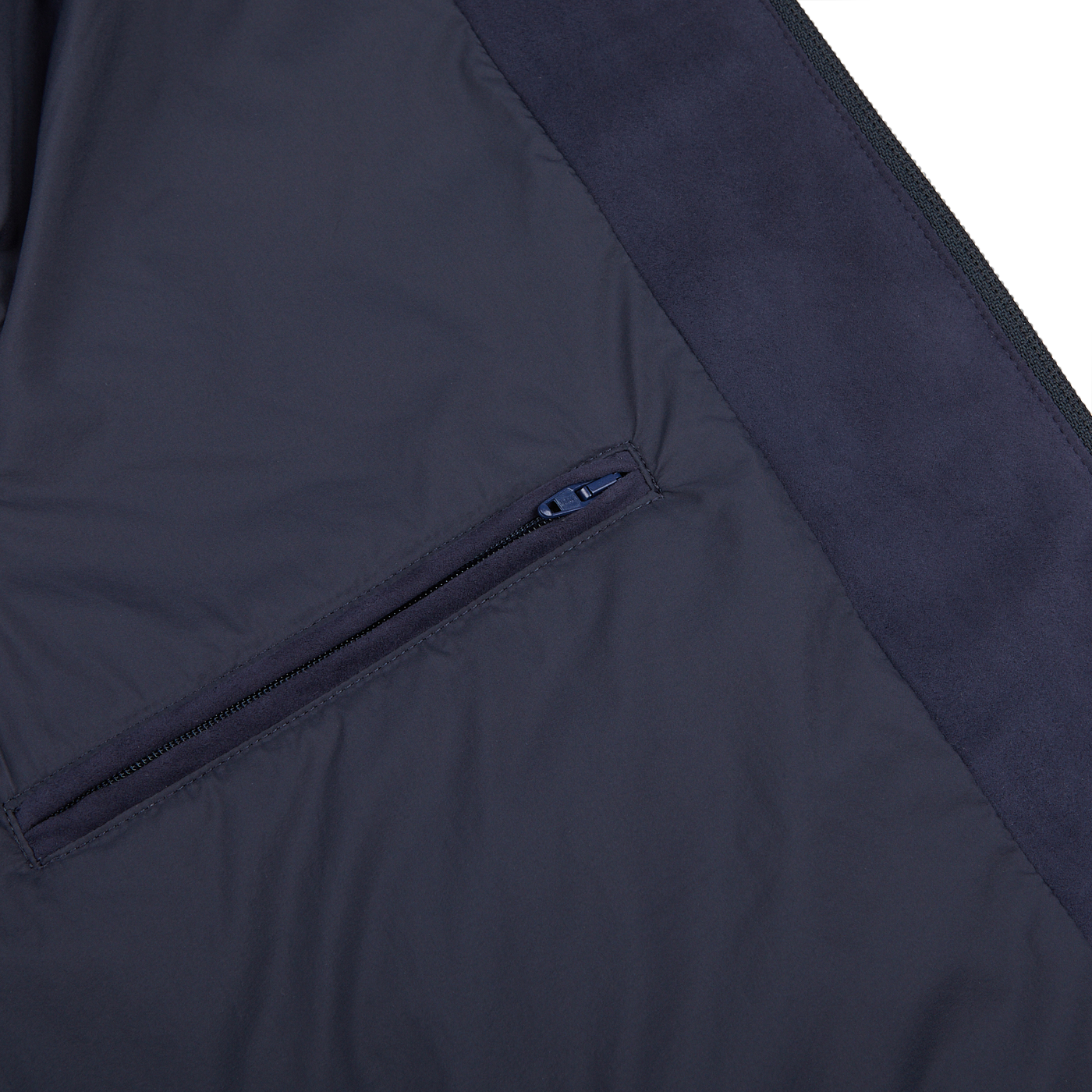 Close-up view of a Herno Navy Blue Suede Alcantara Zip Gilet showing an interior pocket with a zip closure, featuring technical down for added warmth.
