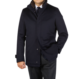 A man wearing a Herno Navy Blue Water Repellent Cashmere Car Coat and tie.
