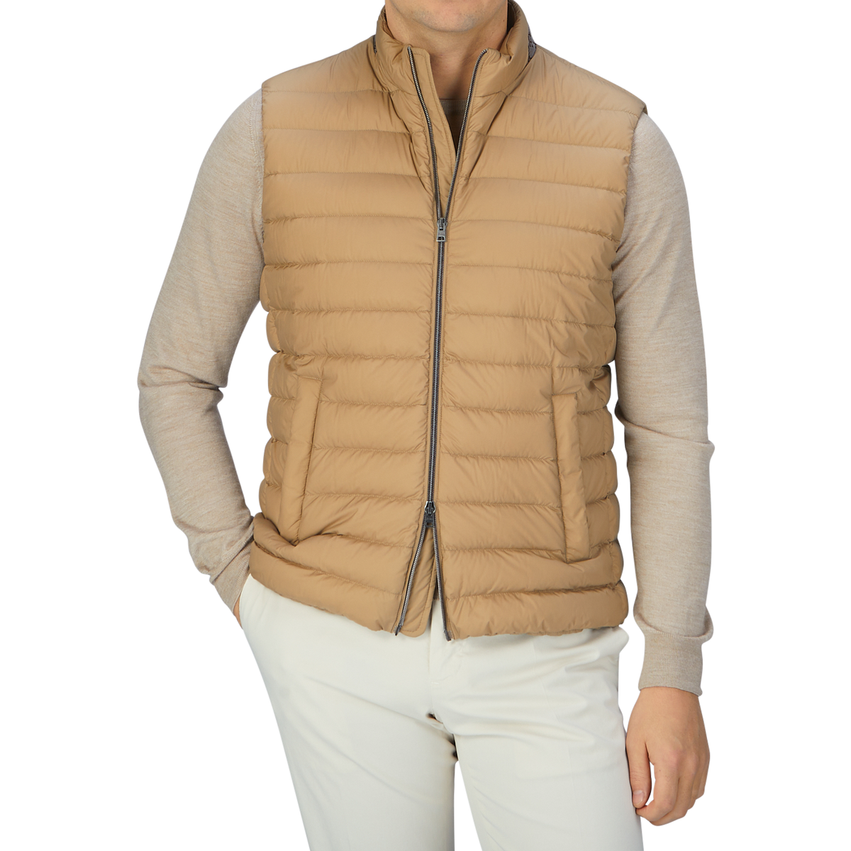 A man in a Herno Sand Beige Nylon Goose Down Quilted Gilet.