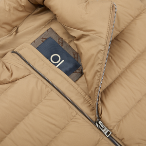 A Herno Sand Beige Nylon Goose Down Quilted Gilet with a zipper.