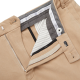 A Hiltl Light Beige Cotton Stretch Regular Fit Chinos in brushed cotton twill, featuring a zipper pocket.