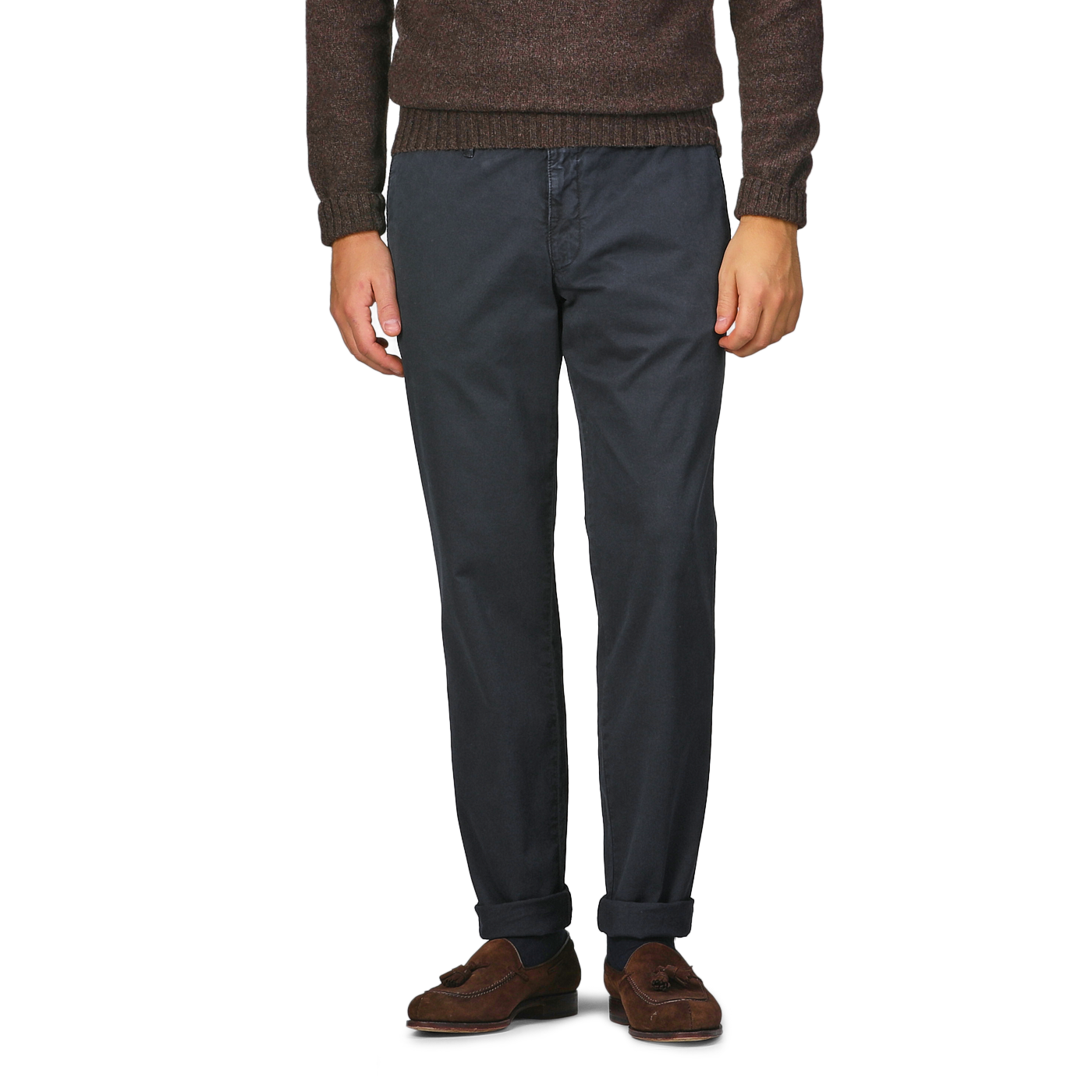 A person wearing a brown sweater, Navy Washed Cotton Gabardine Slim Chinos by Hiltl, and brown loafers stands against a plain background.