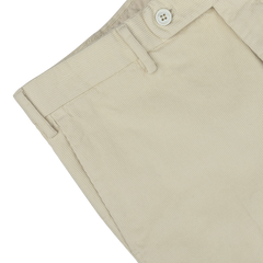 Close-up of Incotex Beige Cotton Corduroy High Comfort Chinos, showcasing the waistband, button, belt loop, and front pocket detail.