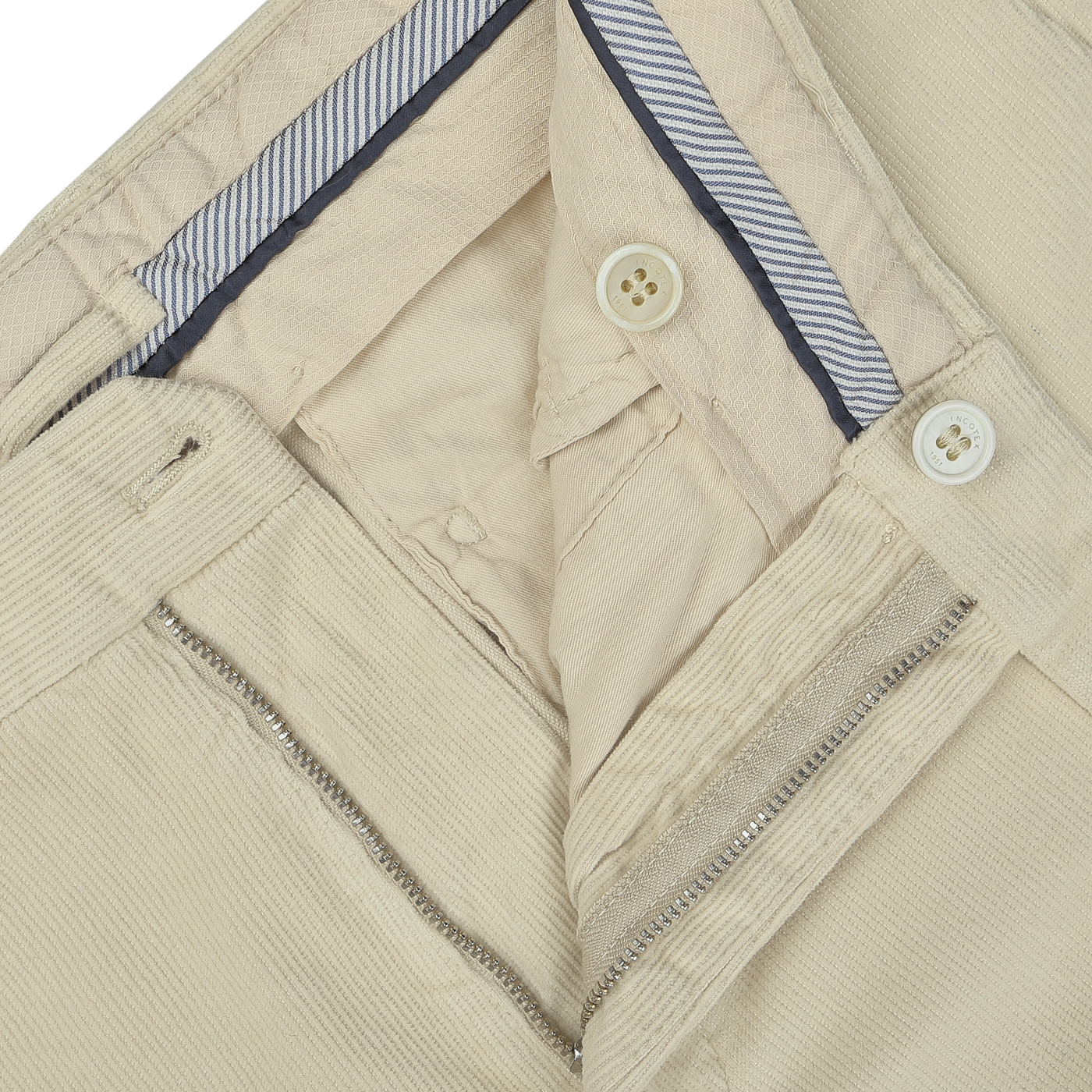 Close-up of the interior of Incotex Beige Cotton Corduroy High Comfort Chinos, showcasing the waistband, buttons, and zipper.