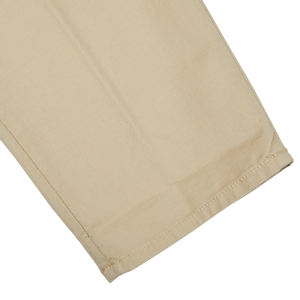 A pair of Incotex Beige Cotton Stretch Pleated Chinos on a white background.