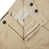 A close up view of Incotex Beige Cotton Stretch Pleated Chinos.
