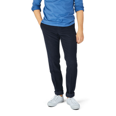 A man wearing Incotex Blue Micro Cotton Corduroy High Comfort Chinos.